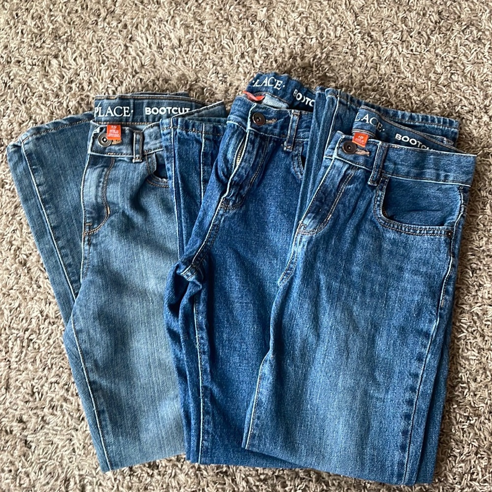 Three pairs of bootleg, size 10 boys jeans. TCP